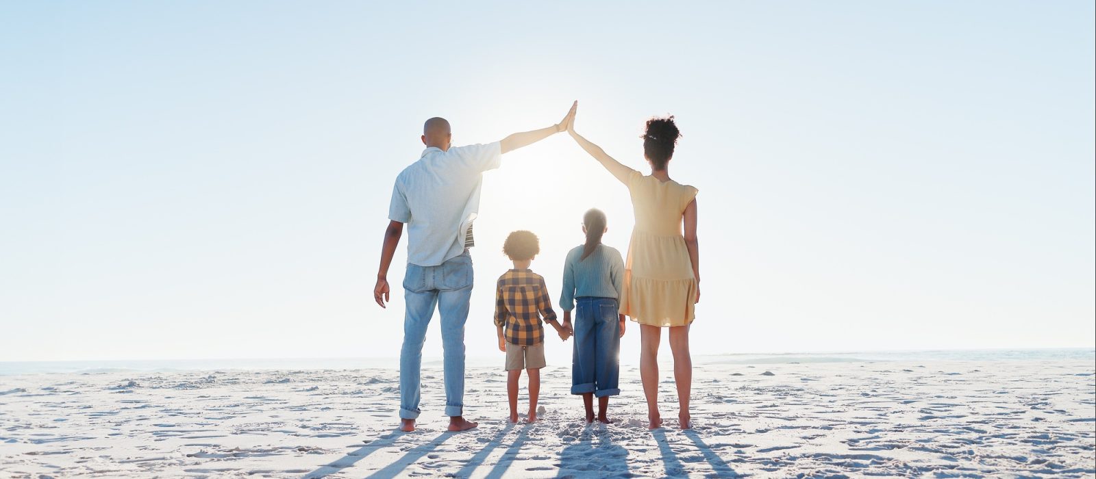 Back, high five or insurance with a family on the beach together for security, travel or vacation.