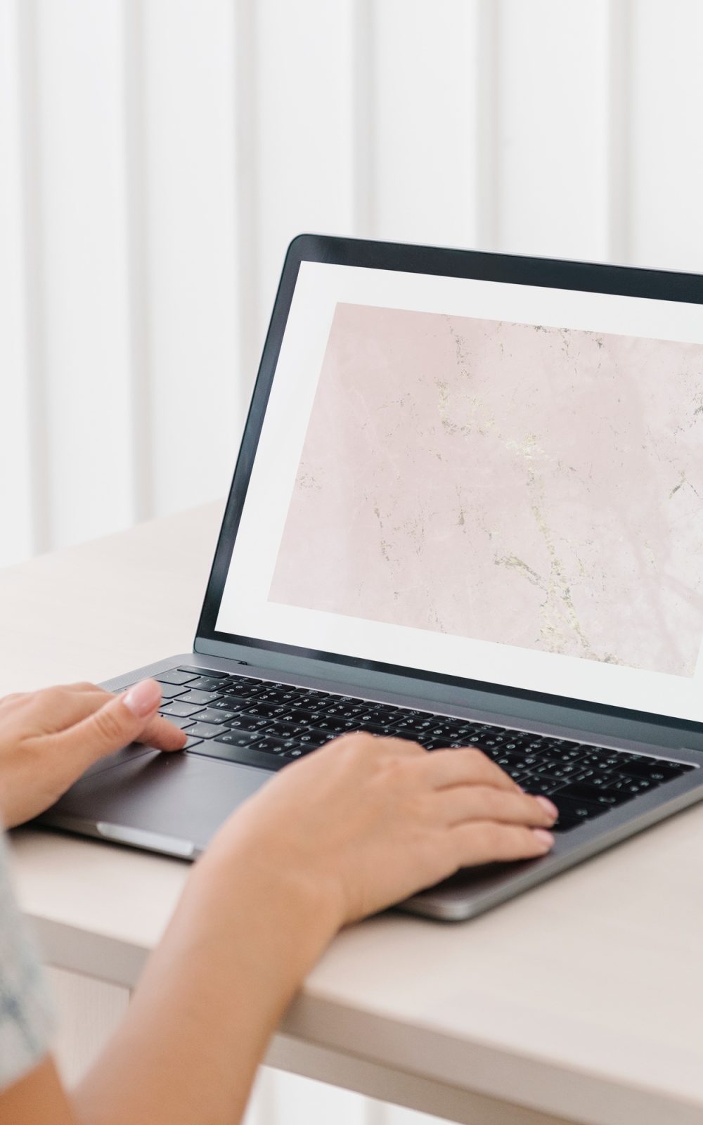 Woman using a laptop mockup